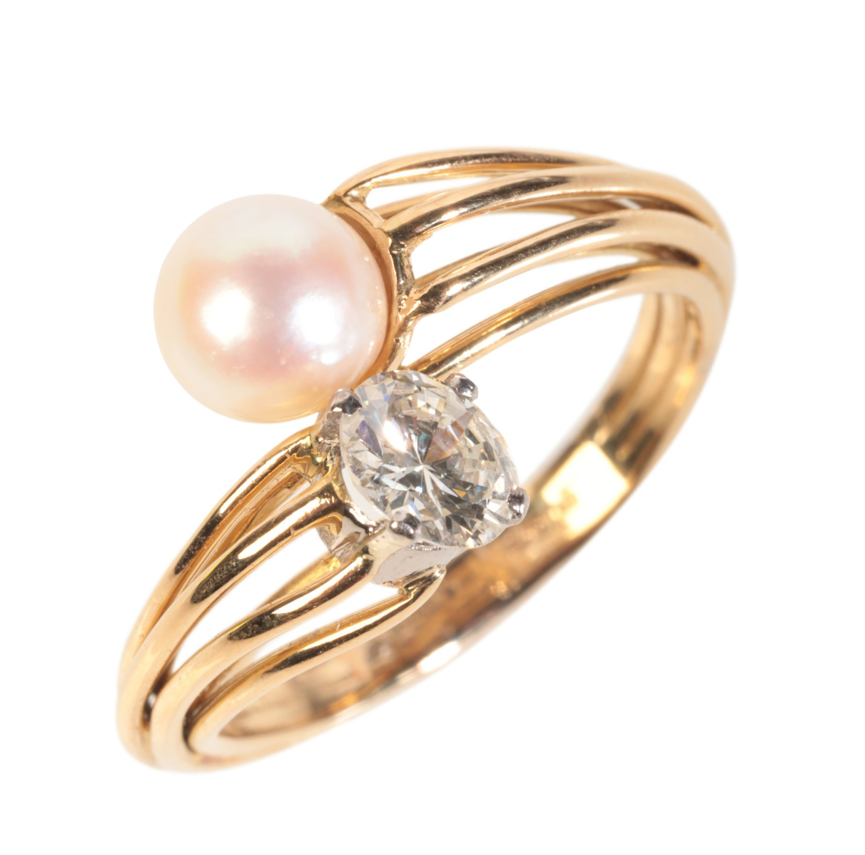 A VINTAGE PEARL AND DIAMOND CROSSOVER RING