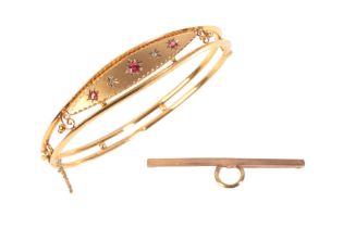 AN ANTIQUE ETRUSCAN REVIVAL RUBY AND DIAMOND BANGLE AND A BAR BROOCH