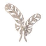 A VINTAGE DIAMOND FEATHER BROOCH