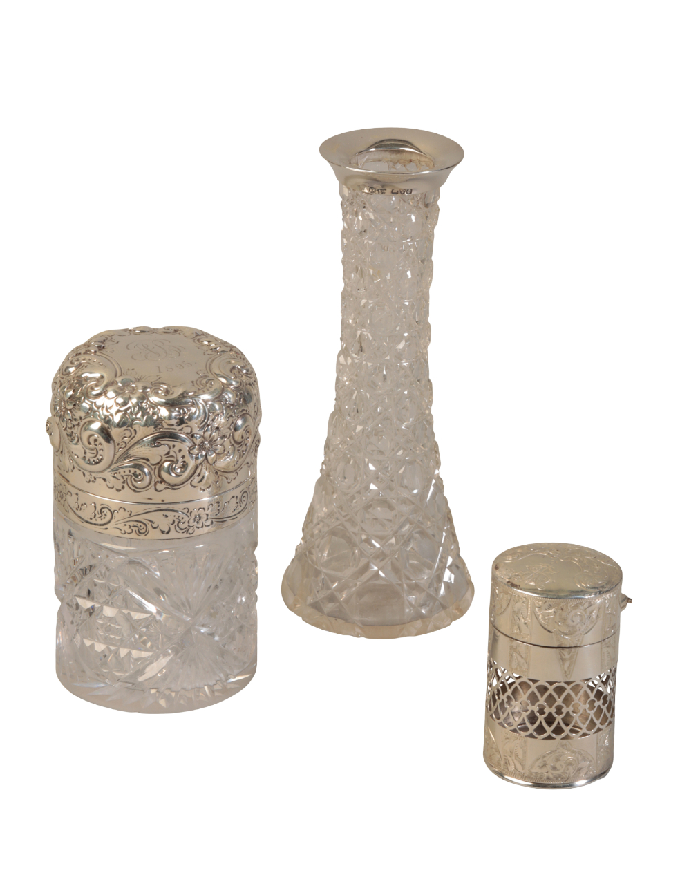 A STERLING SILVER MOUNTED CUT GLASS CYLINDRICAL SCENT BOTTLE