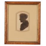 ASCRIBED TO EDWIN HENRY LANDSEER (1802-1873) A silhouette profile portrait of a gentleman