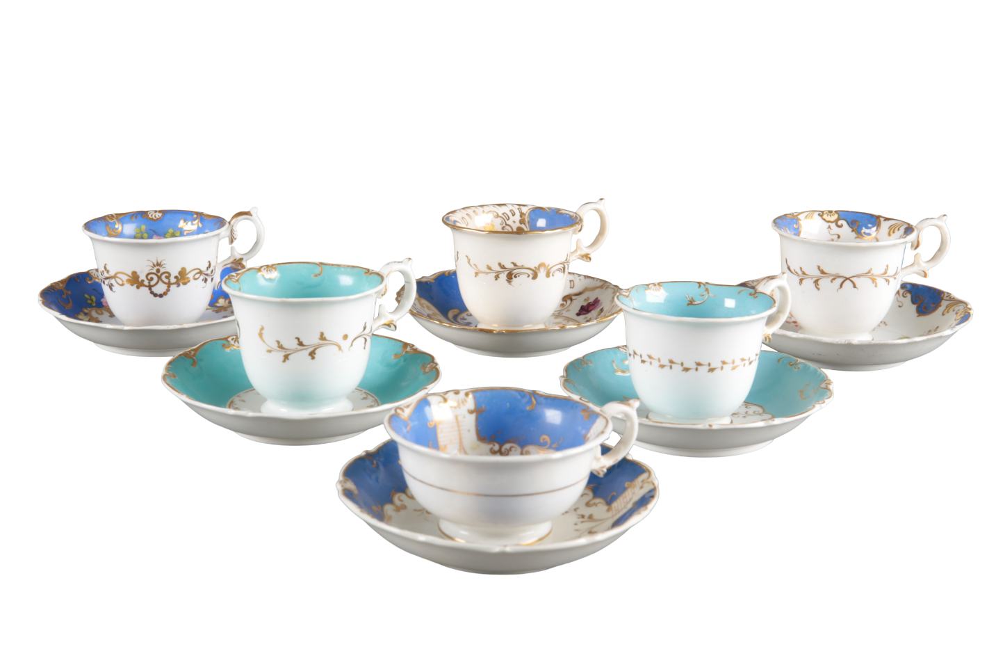 A GROUP OF SIX H & R DANIEL SHELL 'B' SHAPE CUPS AND SAUCERS
