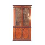 A GEORGE III MAHOGANY AND SATINWOOD LIBRARY BOOKCASE