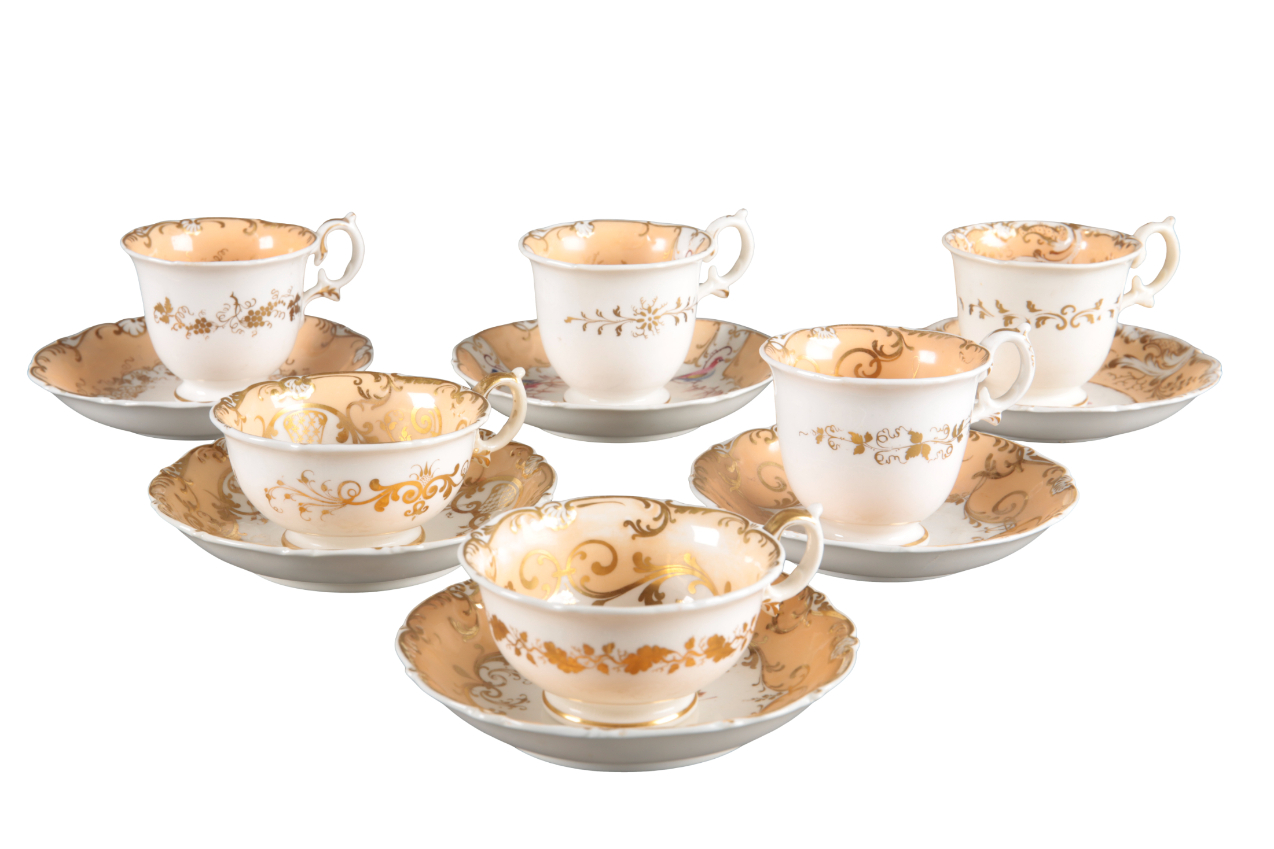 A GROUP OF SIX H & R DANIEL SHELL 'B' PATTERN CUPS AND SAUCERS