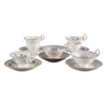 A SET OF FIVE H & R DANIEL SECOND BELL SHAPE CUPS AND SAUCERS