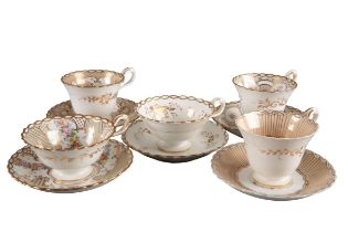 A GROUP OF FIVE H & R DANIEL CHAIN EDGE SHAPE CUPS AND SAUCERS