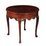 AN EARLY GEORGE III FIGURED MAHOGANY TEA TABLE