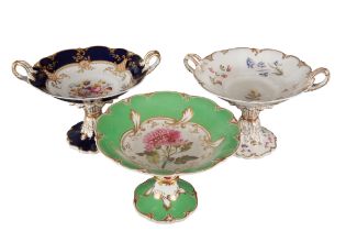 A GROUP OF THREE H & R DANIEL ROCOCO SCROLL SHAPE CENTREPIECES