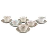 A GROUP OF SIX H & R DANIEL SHELL 'B' SHAPE CUPS AND SAUCERS