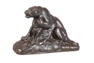 A PATINATED BRONZE OF A LIONESS