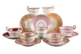 A GROUP OF SEVEN H & R DANIEL SECOND GADROON SHAPE CUPS AND SAUCERS
