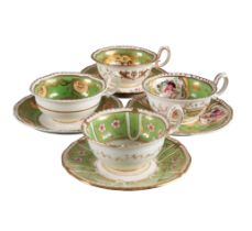 A GROUP OF FOUR H & R DANIEL SECOND GADROON SHAPE TEACUPS AND SAUCERS