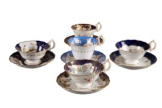 A GROUP OF FIVE H & R DANIEL SECOND BELL SHAPE CUPS AND SAUCERS