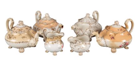 A GROUP OF FOUR H & R DANIEL SHELL 'B' SHAPE TEAPOTS