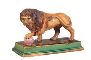 GEORGE SKEY, WILNECOTE WORKS, TAMWORTH: A MAJOLICA MODEL OF A MEDICI LION