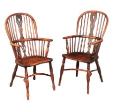 A MATCHED PAIR OF YEW, ASH AND ELM WINDSOR ARMCHAIRS