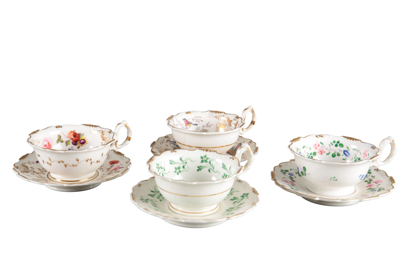 A GROUP OF FOUR H & R DANIEL TEACUPS AND SAUCERS