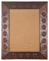 AN ARTS AND CRAFTS STYLE COPPER MIRROR OR PICTURE FRAME