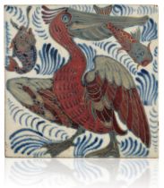 WILLIAM DE MORGAN (1839-1917): A RARE 'TRIPLE LUSTRE' LATE FULHAM PERIOD TILE 'PELICAN WITH FISH