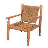 MANNER OF ADRIEN AUDOUX AND FRIDA MINET: A SISAL WEAVE BEECH ELBOW CHAIR