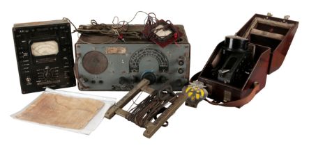 A RADIO RECEIVER, AN ELECTRICAL/CIRCUIT SELECTOR TESTER AND A BUBBLE SEXTANT(3)