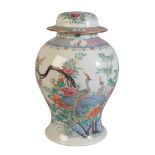 A CHINESE BALUSTER SHAPED VASE AND COVER