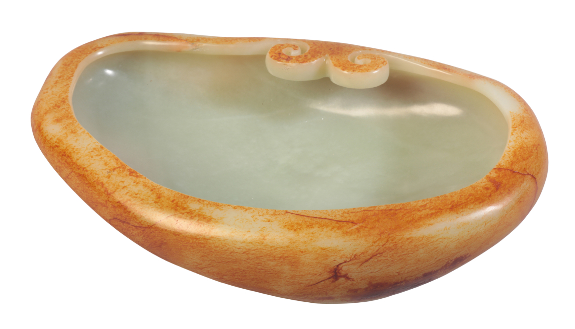 A CHINESE JADE BOWL OF MASSIVE PROPORTIONS