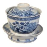 A CHINESE BLUE AND WHITE GAIWAN TEA BOWL, COVER AND STAND