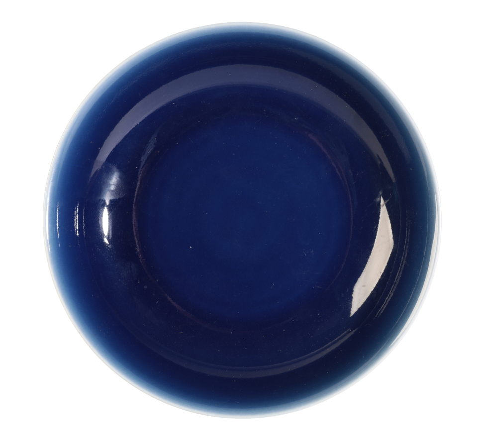 A CHINESE MONOCHROME BLUE-GROUND BOWL