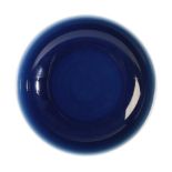 A CHINESE MONOCHROME BLUE-GROUND BOWL