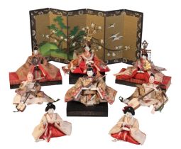 A COLLECTION OF EIGHT DOLLS FOR THE FESTIVAL OF HINAMATSURI, OR GIRL'S DAY