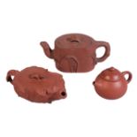 THREE CHINESE YIXING TEAPOTS AND COVERS
