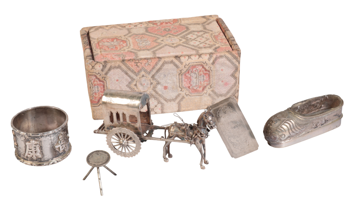 A CHINESE WHITE METAL MODEL OF A HORSE AND CART