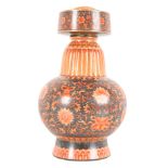 A CHINESE CORAL-RED ALTAR 'BAJIXIANG' VASE