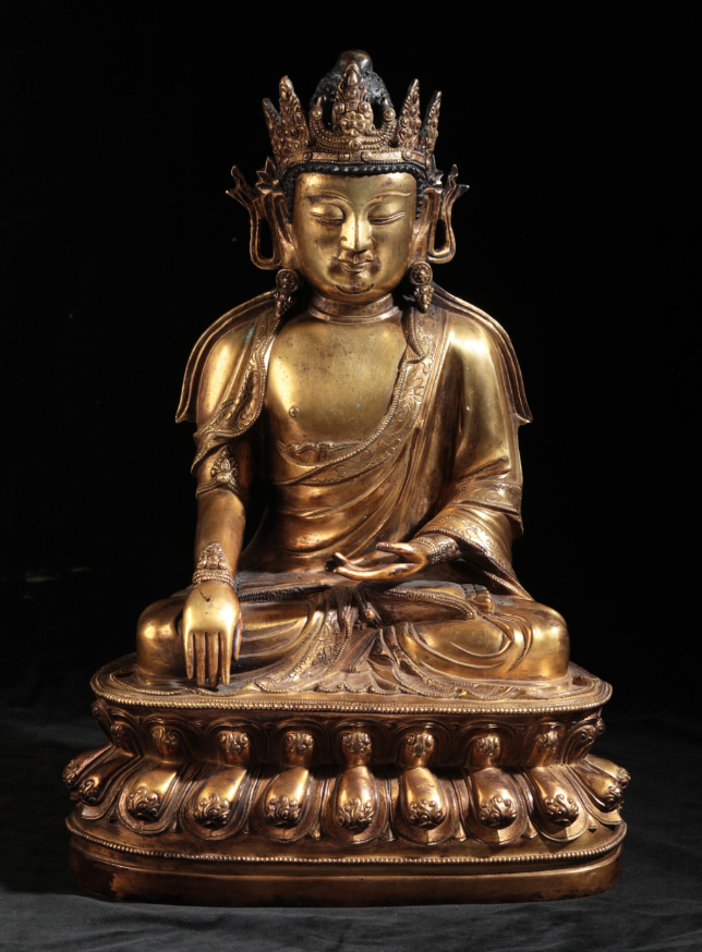 A CHINESE GILT-BRONZE BUDDHA