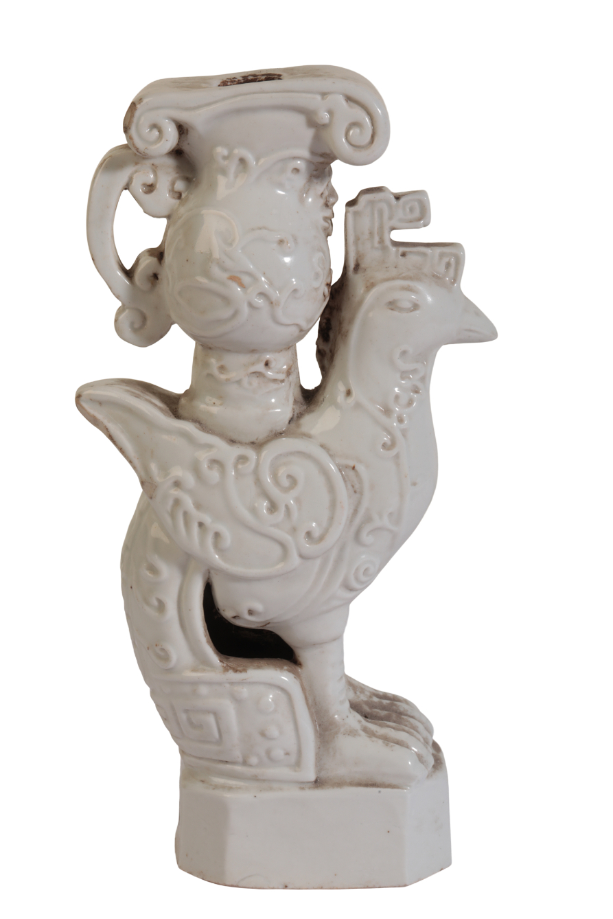 A CHINESE BLANC DE CHINE CANDLESTICK