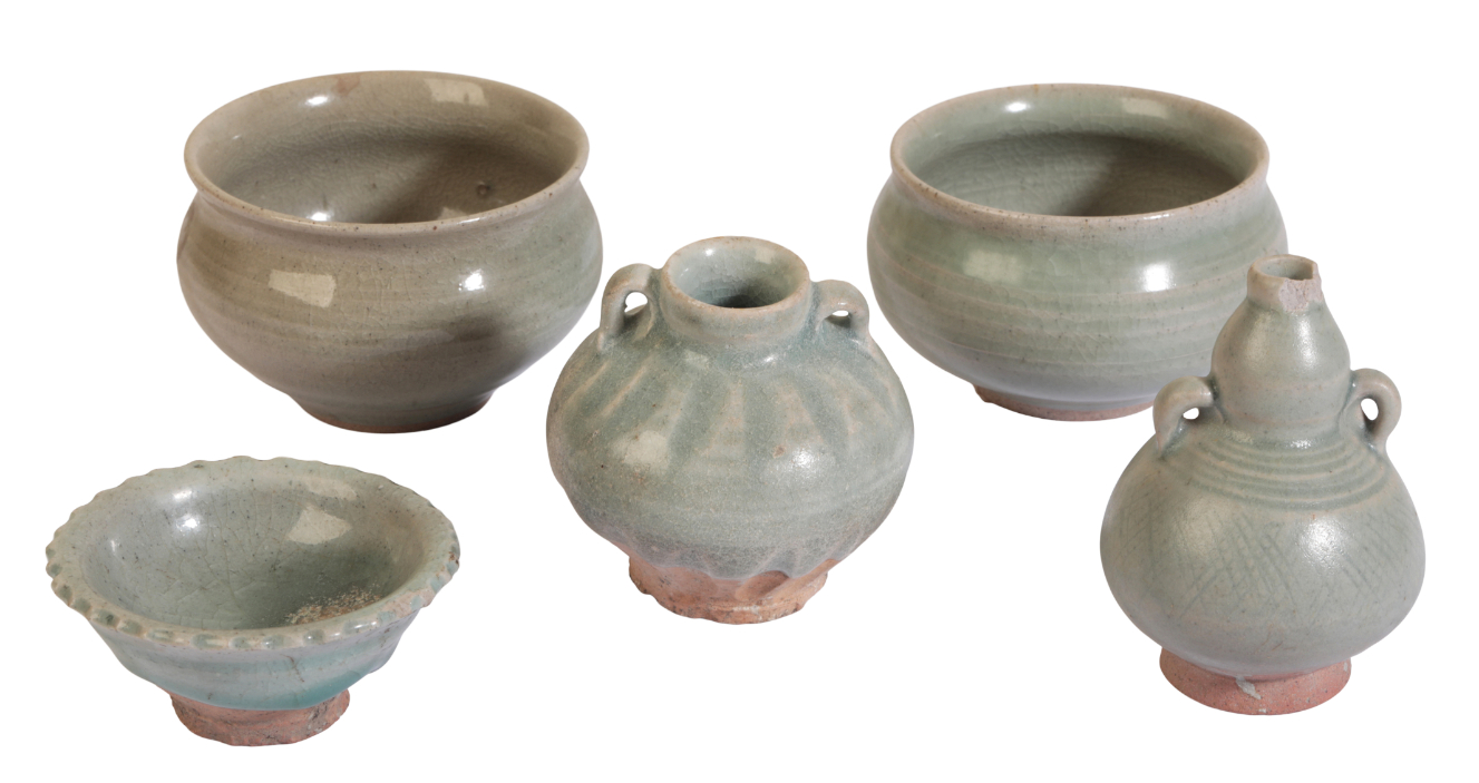 A GROUP OF FIVE SOUTH EAST ASIAN CELADON GLAZED VESSELS