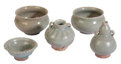 A GROUP OF FIVE SOUTH EAST ASIAN CELADON GLAZED VESSELS