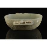 A CHINESE CELADON JADE OVAL BOWL