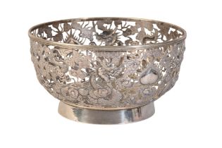 A CHINESE EXPORT PIERCED WHITE METAL BOWL