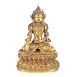 A GILT-BRONZE SHAKYAMUNI BUDDHA