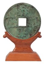 A CHINESE BRONZE COIN