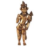 A NEPALESE GILT BRONZE FIGURE OF MANJUSHRI