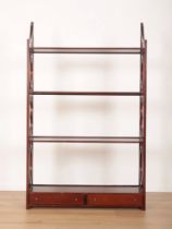 A MAHOGANY OPEN HANGING BOOKCASE OF CHINESE CHIPPENDALE DESIGN