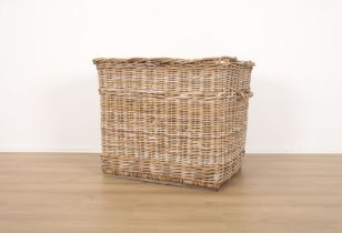 A LARGE COUNTRY HOUSE WICKER LOG BASKET
