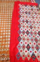 AN OLD HEXAGON PATCHWORK QUILT