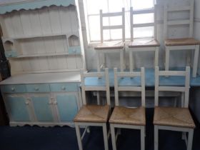 A PAINTED KITCHEN TABLE AND SIX CHAIRS