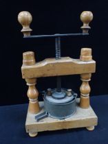 AN OLD BEECHWOOD, TIN AND METAL KITCHEN PRESS
