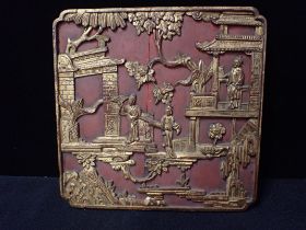 A CHINESE CARVED, PAINTED AND GILT WOOD PANEL