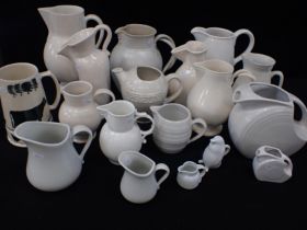 A COLLECTION OF WHITEWARE JUGS, FIESTA WARE